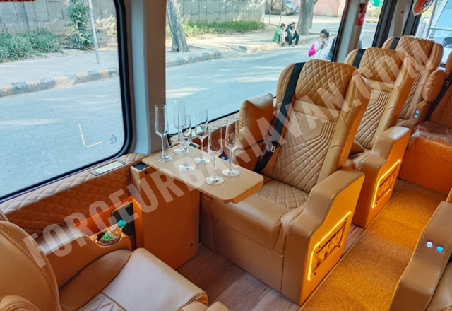10 seater ultra luxury force urbania van with 1x1 modified recliner motorized seats on rent in delhi